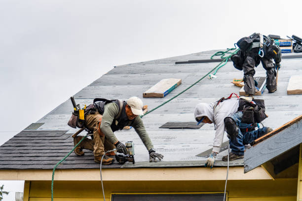 Professional Gutter Installation technician working in Harmony, RI
